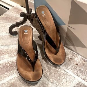 Good condition. Dani black Black Patent Thong Wedge.  Leather sock
